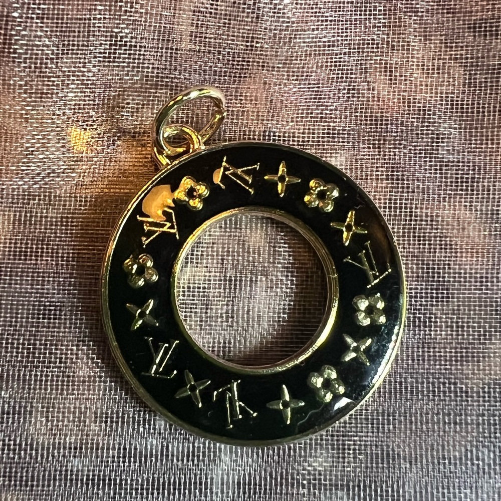 Louis Vuitton Black and Gold zipper pull size of nickel